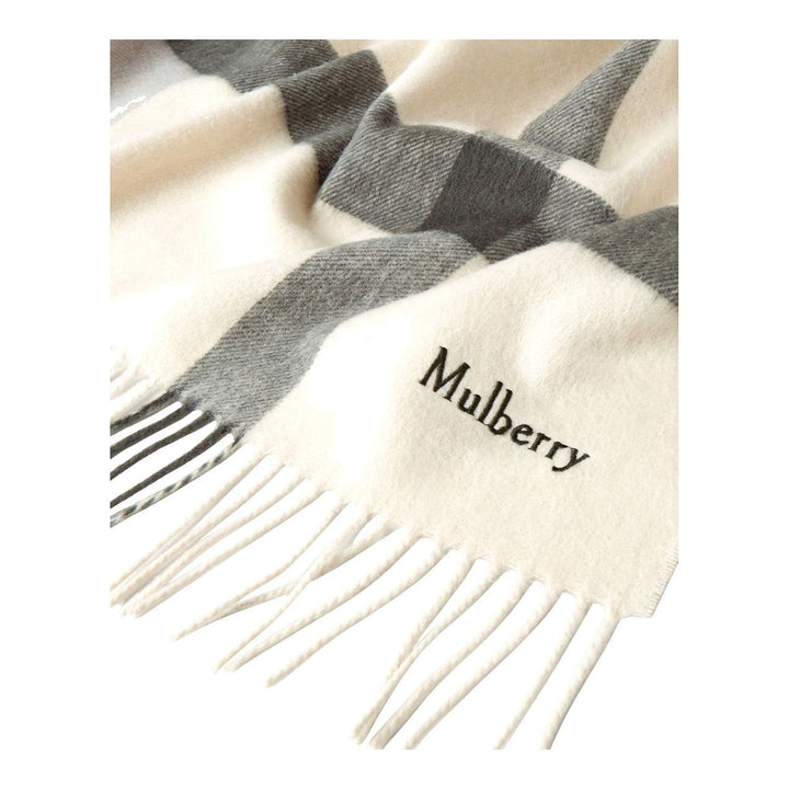 Mulberry large check merino wool scarf in green and sage tones with fringed edges and embroidered logo, folded flat - packshot