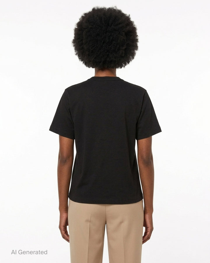 Noir Kei Ninomiya black cotton ponte tee with three dimensional bow appliqués and star-cut panels cascading diagonally down the front - back