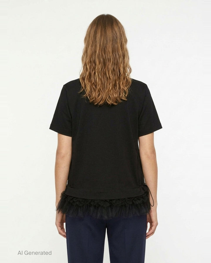 Noir Kei Ninomiya black cotton short sleeve crewneck tee with gathered tulle frill hem and drawstring waistband detail, flat lay on white background - back