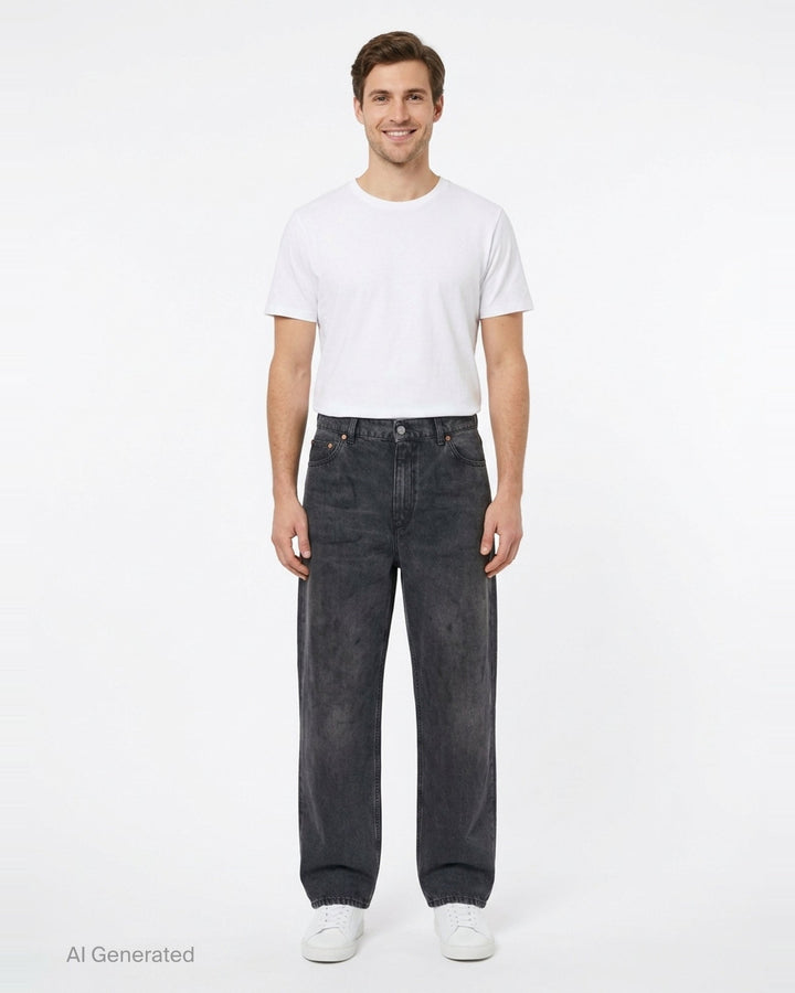 Our Legacy Vast Cut Jeans in washed black denim, featuring a wide-leg silhouette, high rise, copper rivets, and organic cloud-fade wash effect - front