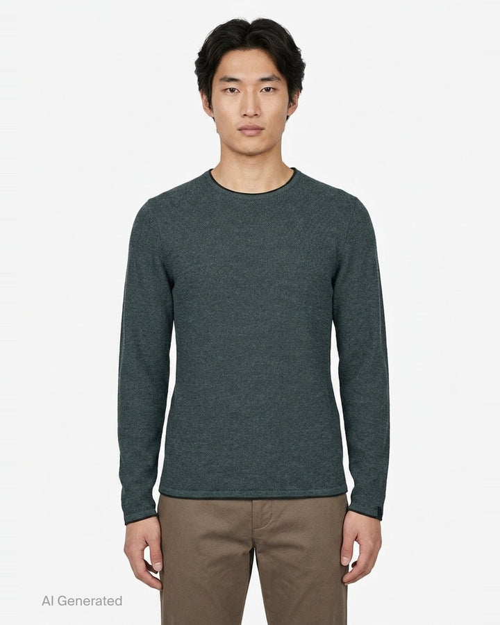 rag & bone Brooks Wool Crew Sweater in deep teal, featuring a slim fit, crew neckline, long sleeves, and raw-edge cuffs, displayed on a flat ghost mannequin - front