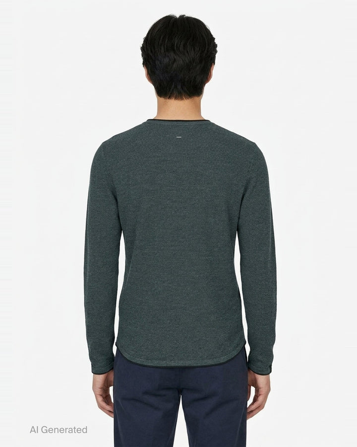 rag & bone Brooks Wool Crew Sweater in deep teal, featuring a slim fit, crew neckline, long sleeves, and raw-edge cuffs, displayed on a flat ghost mannequin - back