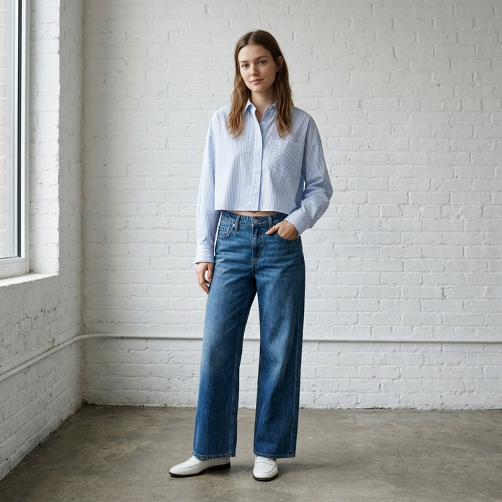 rag & bone Cam Ankle Straight Jeans in mid-blue washed denim with relaxed straight leg and cropped ankle hem, shown flat from the front - lifestyle