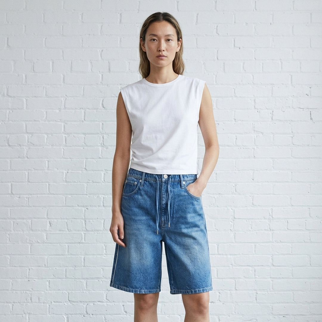 rag & bone Miramar Pull On McKenna Shorts in mid-blue washed denim with a relaxed bermuda silhouette, elasticated pull-on waistband, and five-pocket detailing - lifestyle