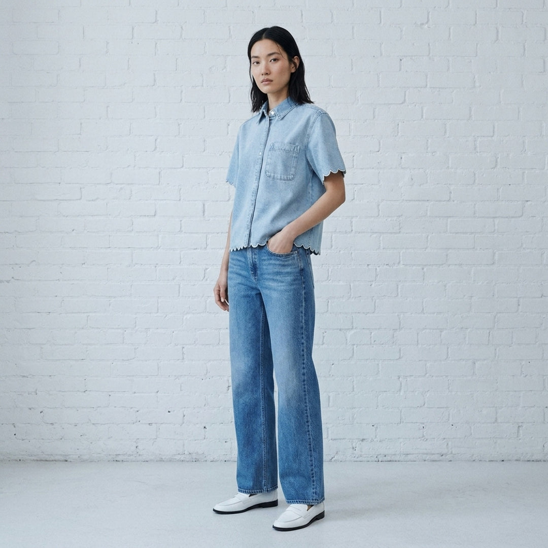 rag & bone Miramar wide leg jeans in light blue wash, shown flat with high-rise waist, five-pocket styling, and a gently flared hem - lifestyle