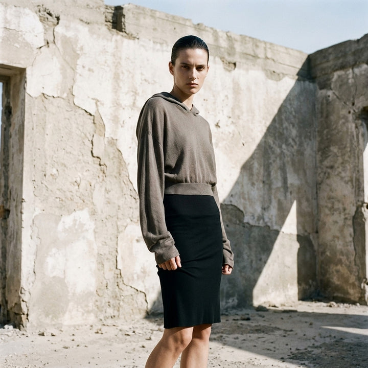 Rick Owens cropped knit sweater in taupe-grey with draped neckline, dolman sleeves and ribbed hem, front view - lifestyle