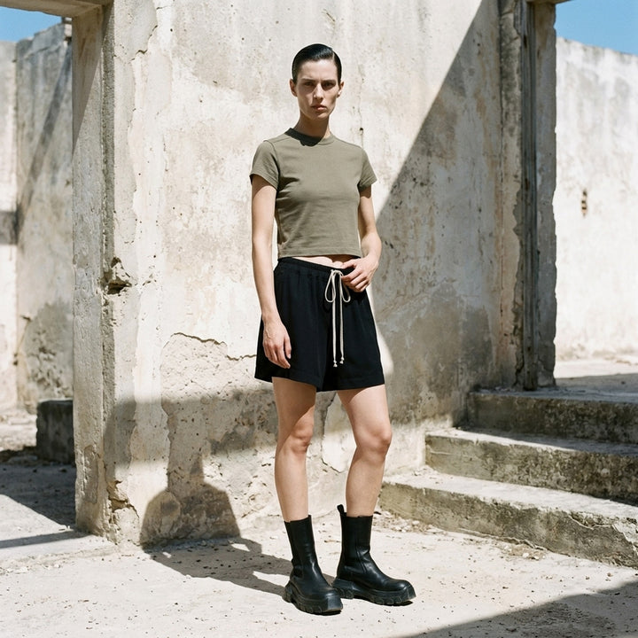 Rick Owens Cropped Level T-Shirt in muted taupe-grey with ribbed crew neck and short cap sleeves, front view - lifestyle