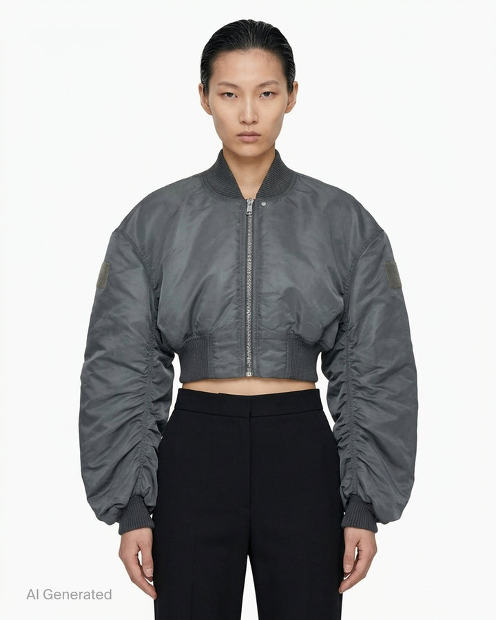 Rick Owens Micro Secchia washed bomber jacket in grey with cropped body, ruched voluminous sleeves and ribbed collar, cuffs and hem - front