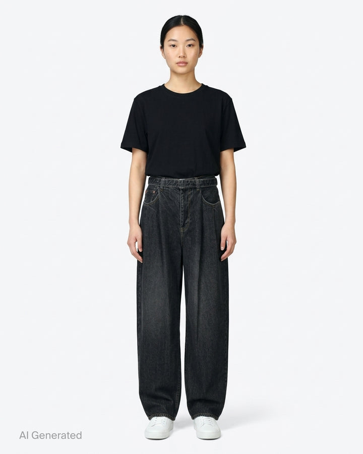 sacai belted wide-leg barrel jeans in washed black denim with deep front pleats, contrast stitching, and tapered hem, photographed flat on white background - front