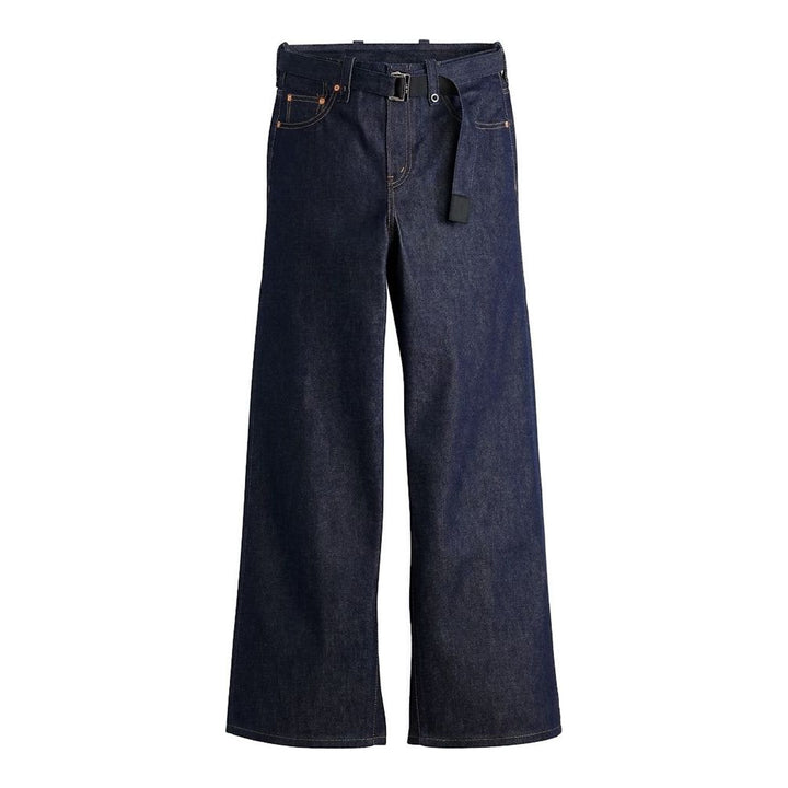 sacai wide-leg washed blue jeans with layered waistband and black belt with metal buckle, shown from the front - packshot