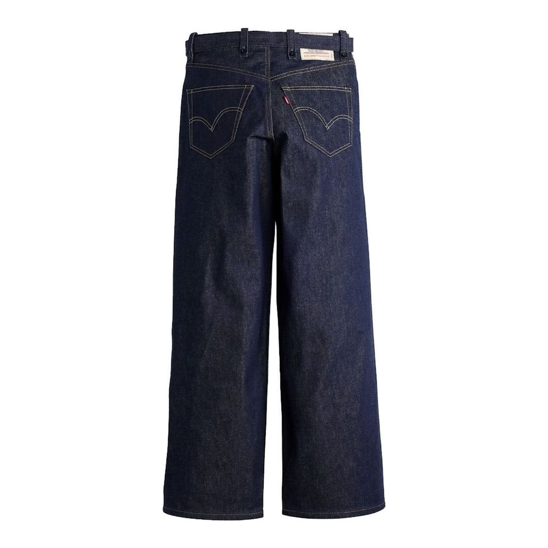 sacai x Levi's wide-leg mid-wash blue jeans with layered waistband and integrated webbing belt, shown flat from the front - packshot
