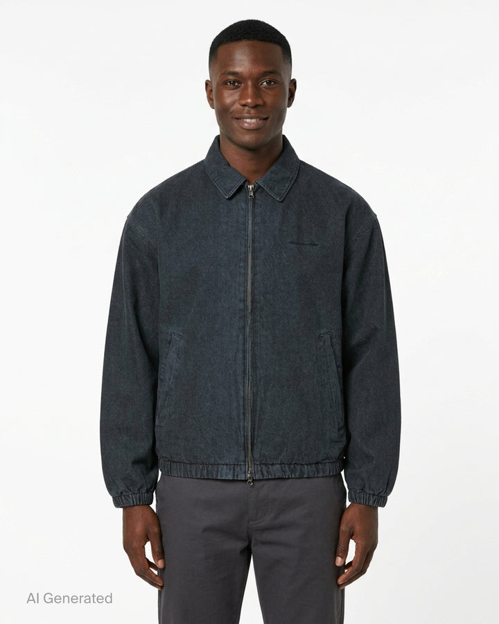 thisisneverthat Graffiti Print Denim Blouson Jacket in washed blue with all-over tag-style calligraphic print, full-zip closure, point collar, and elasticated hem and cuffs - front