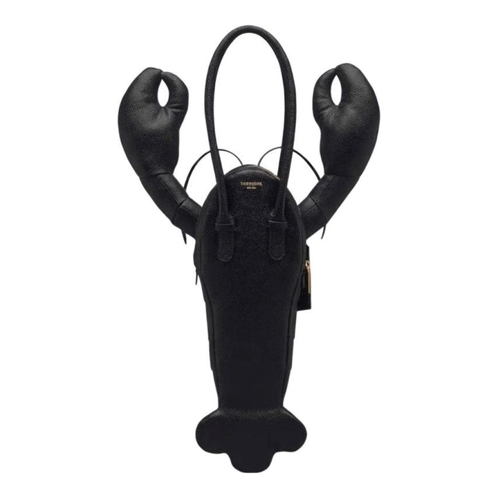 Thom Browne black pebble-grain leather lobster-shaped tote bag with raised claws, rolled handles and a luggage tag - packshot