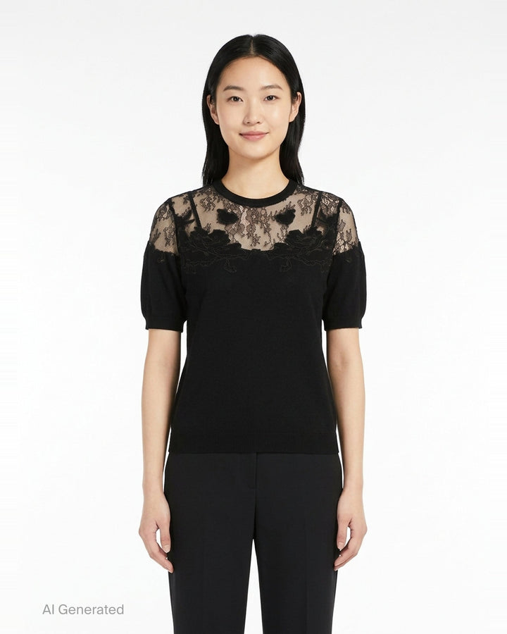 Ulla Johnson Ella Short Sleeve Lace Top in black, featuring a sheer floral embroidered lace yoke, puffed short sleeves, and a fine-knit body with keyhole back closure - front