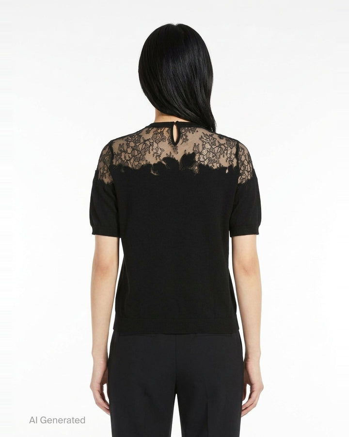 Ulla Johnson Ella Short Sleeve Lace Top in black, featuring a sheer floral embroidered lace yoke, puffed short sleeves, and a fine-knit body with keyhole back closure - back