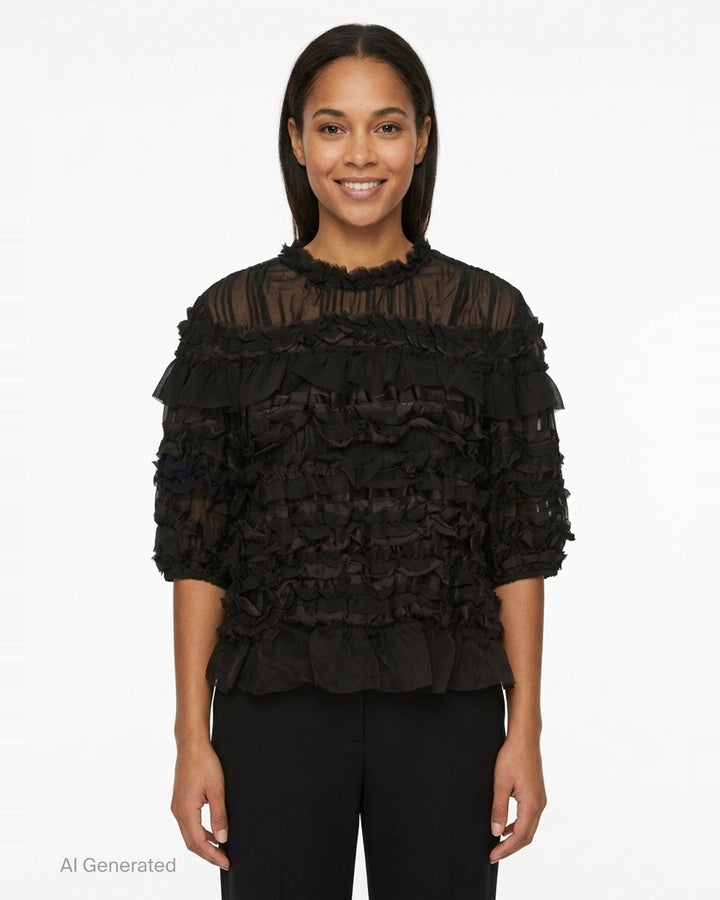 Ulla Johnson Mabel Short Sleeve Silk Top in black — sheer silk with cascading tiered ruffles, frayed collar trim, and puffed short sleeves - front
