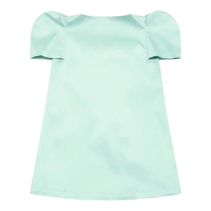 Vaquera mint green satin dress with puff sleeves and an oversized pleated bow at the front, shown flat against a white background - packshot