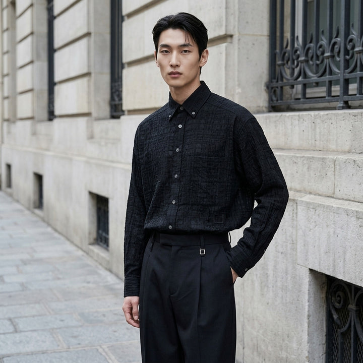 Wooyoungmi Crinkled Texture Long Sleeve Shirt in black, featuring a semi-sheer tonal plaid weave, button-down collar, chest patch pocket, and tone-on-tone Wooyoungmi Paris logo - lifestyle